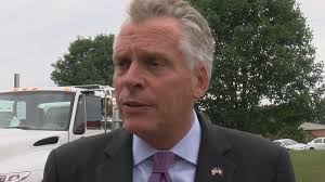 Gov. McAuliffe spotted with Willie Nelson -- and his weed