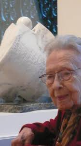 Signing memorial book for class of 1954