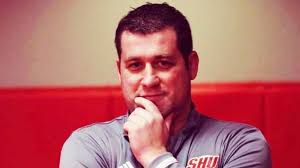 John Clark is turning Sacred Heart into a wrestling success story