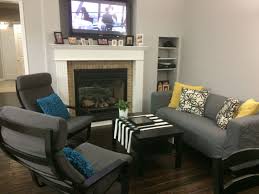 Family Room Grey Yellow Blue Ikea Klippan Poang Armchairs Coffee Table Pillows From Ikea Bouclair Accen Living Room Goals Ikea Living Room Family Room