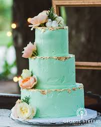 Want To Add A Touch Of Glam To Your Wedding Cake Gold Foil And Blush Flowers Will Do The Trick Mint Wedding Cake Green Wedding Cake Fall Wedding Cakes