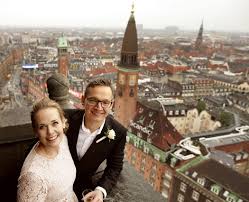 Wedding On Top Of Copenhagen City Hall Tower With View Over The Rooftops Of Copenhagen Copenhagenwedding Copenhagen City Denmark Wedding Copenhagen Wedding