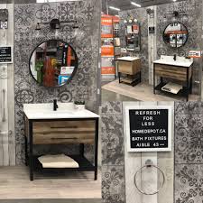 Shop plumbing and more at the home depot. 7114 The Home Depot Canada Bathroom Display Refresh For Less Round Mirror Bathroom Bathroom Display Bath Fixtures