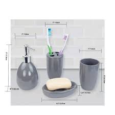 Toothbrush holder, lotion / soap dispenser, vanity tray, cotton jar. 4 Piece Bath Accessory Set Grey Overstock 28110699