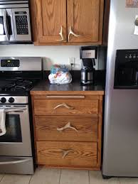 These realistic looking antler drawer/cabinet pulls will look great in the kitchen or bathroom. Real Dear Antlers Used For Handles In Cabinets And Drawers Rustic Cabinet Hardware Diy Furniture Accessories Rustic Kitchen Cabinets
