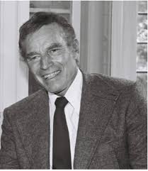 Why was the article about Charlton Heston taken down?