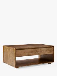 Made of solid mango wood that beautifully displays the natural grain of the wood, our anton coffee table is a modern take on rustic farmhouse style. West Elm Anton Storage Coffee Table Brown At John Lewis Partners