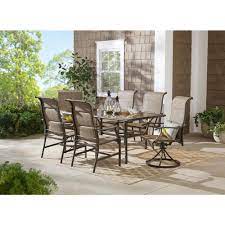 Are there any espresso brown chairs for outdoor dining? Hampton Bay Riverbrook Espresso Brown 7 Piece Outdoor Patio Aluminum Rectangular Glass Top Dining Set With Padded Sling Chairs Fm18107 Al Dcsv The Home Depot