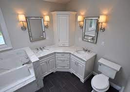 Some corner bathroom sinks can be shipped to you at home, while others can be picked up in store. Custom Master Bathroom With Double Corner Vanity Tower Cabinet Wall Sconces Toilet And Corner Bathroom Vanity Beautiful Bathroom Cabinets Stylish Bathroom