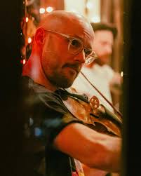 STRINGBAND OF BROTHERS Some scenes from a recent edition of Mark  Killanski's weekly Stringband Tunesday, tonight featuring Joseph  Lubinsky-Mast, Trent Freeman and John Reischman. Show at 8 PM