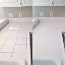 Use a toothbrush dipped in a solution of water and a small amount of bleach to lighten dark grout between tile. Cleaned Grout Made Easy In The Kitchen Clean Tile Grout Tile Grout Kitchen Counter Tile