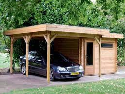 Whether you're a car lover or just tired of scraping snow and blowing leaves off of your ride, timber framed carports enhance homes and increase their value. Dublin Wooden Carport Workshop Combination From Lugarde Wooden Carports Carport Carport Sheds