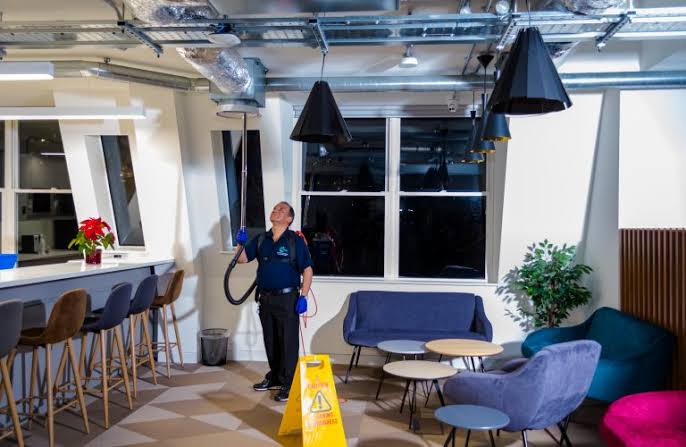 Orpington High St Office Crew conducting commercial desk cleaning