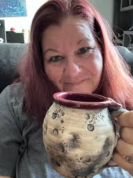 Who is the artist of this handmade pottery piece with internal swirl and  nuka iron color scheme?