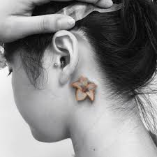 A butterfly tattoo can refer to a meaningful change that the person has gone through. 21 Small Ear Tattoos For Minimalists Tiny Ear Tattoo Ideas Allure