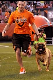 Some people are fans of the cleveland browns. My Son The Mascot Handler For The Browns W His Dog Swagger Cleveland Browns Football Browns Football Go Browns