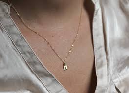 Maybe you would like to learn more about one of these? Delicate Luck 14k Gold Chain Necklace Padlock Elegant Necklace