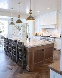 White Kitchen With Oak Island And Floors Farmhouse Kitchen Design Home Decor Kitchen Home Kitchens