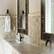 So, normally the rule of thumb for a shower pan slope is 1/4 we did a large pebble (more like stones) backsplash. Pebble Backsplash Nbizococho