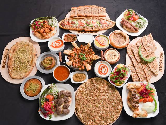 Authentic Central Anatolian feast featuring traditional Konya etli ekmek and roasted meats