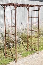 To ensure longevity and optimal appearance, wrought iron and metal trellis owners typically have to purchase special cleaning and. 65 W X 101 5 T Wrought Iron Mission Arbor Metal Flower Garden Arch Trellis Ebay