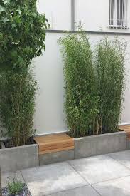 Sitzelement Aus Holz Und Beton In 2020 Holz Im Garten Gartengestaltung Garten