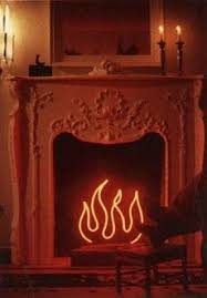 Great Way To Get Around The Uptight Don T Light Your Fireplace Rules Of College Neon Signs Fireplace Garden Neon Sculpture