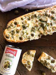 Green Olive Garlic Cheese Bread California Grown Recipe Garlic Cheese Bread Olive Recipes Recipes