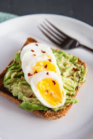 Avocado Toast Lovers Unite Hard Boiled Eggs With Avocado Toast Is A Healthy Protein Packed Breakfast In 2020 Healthy Breakfast Avocado Recipes Avocado Toast Recipe