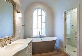 Kohler bellwether bath tub 66 l x 32 w cast iron soaking for three wall alcove installations with integral apron and left drain model: Arched Tub Alcove With Barrel Ceiling Transitional Bathroom