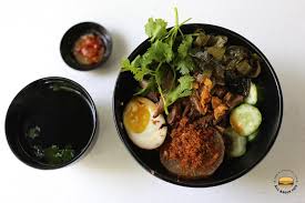 In this recipe, duck legs are carefully seared and braised in a mixture of stock, soy sauce, oyster sauce, sesame oil, and aromatics. All About Ceil Jin Ji Teochew Braised Duck Kway Chap At New Upper Changi Road