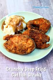 Fried catfish is considered a quintessential southern dish along with southern fried chicken, sweet tea, and hushpuppies. Crispy Deep Fried Catfish Steaks Piggy Out