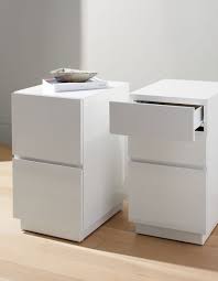 Clean Lined 2 Drawer File Cabinet Rises In White As Simple Storage Designed By Mermelada Est Filing Cabinet Modern File Cabinet Office Furniture File Cabinets