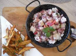 A traditional tapas favourite, the tentacles are boiled until tender and served on waxy potatoes slices, simply drizzled with octopus, only 3 tentacles required. The Octopus Salad With Sweet Potatoes Picture Of Tapas Uva Alvor Tripadvisor