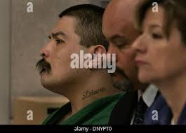 Feb 07, 2006; Vista, CA, USA; ADRIAN CAMACHO, left, listens to a statement  by victim's father Tony Zepetella (not in photo) during CAMACHO'S  sentencing hearing