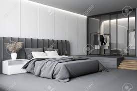 The louis philippe iii collection brings traditional style details from its sleigh beds, featuring kd headboard, and footboard. Corner Of Luxury Master Bedroom With White Panel Walls Gray Stock Photo Picture And Royalty Free Image Image 133035070