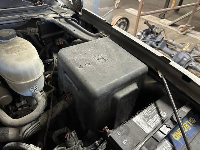Cadillac Escalade Underhood Fuse Box Location, AI generated