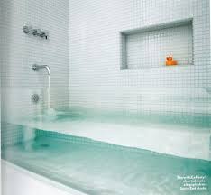 Make a Big Splash: Clear Glass Tub | Glass tub, Glass bathtub, House and  home magazine