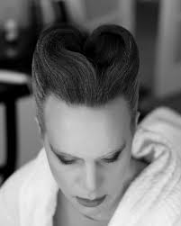 When the bride is one of the biggest Disney lovers in the Kingdom, you  throw hard Couture Cinderella's Stepmother hair and hide a heart in it as  big as hers & the