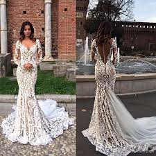 Mix and match with different fabrics, lengths, and colors to trumpet wedding dresses: 2018 Modest Lace Mermaid Wedding Dresses With Long Sleeves V Neck Trumpet Illusion Backless Bridal G Backless Bridal Gowns Backless Wedding Wedding Dress Train