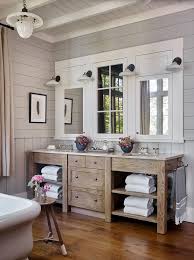 This bathroom by jennifer worts also features a beveled mirror for extra reflection and an acrylic stool for a touch of modern style. Oak Dual Washstand With Towel Shelves Country Bathroom Pratt And Lambert Chalk Gray