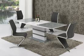 Our range of white extending dining tables offers many styles, shapes and sizes in clean, elegant white. Large Extending Grey Glass White Gloss Dining Table And 8 Chairs