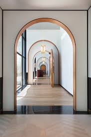 Arches And Low Lighting Create Moody Atmosphere At Singapore Bistro In 2020 Corridor Design Interior Architecture Design Home Interior Design