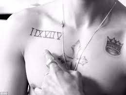 Justin bieber is rocking his new bad boy image, isn't he? Justin Bieber Wants To Erase Tattoo Of Ex Girlfriend Selena Gomez Daily Mail Online
