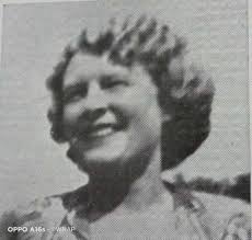 Staff member ivy Morris now sadly passed away with huwie Green at Barry  woolworth store 108