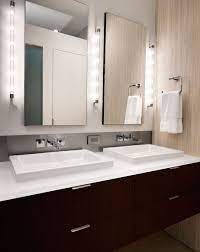 Aerin renwick 19 inch 4 light chandelier by visual comfort and co. 22 Bathroom Vanity Lighting Ideas To Brighten Up Your Mornings