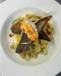 Indulge in the perfect harmony of flavors! 🌿✨ Herb-crusted salmon paired  with a creamy mushroom Florentine sauce, roasted vegetables, and golden  potato wedges. A feast for the senses that's as beautiful as