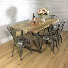 Farmhouse dining tables typically feature natural wood or distressed paint finishes. Rustic Dining Table Industrial 6 8 Seater Solid Reclaimed Wood Metal B Shabby Bear Cottage