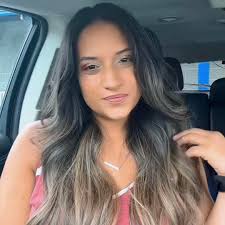 A film where the protagonist is a young guy, and he meets this hitman or  assassin, and starts to be trained by him to this business. It's in a city  area, possibly