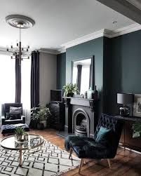 The Dark Green Wall And Green Details Could Not Be More Perfectly Chosen In This Living Room It Was Creat Dark Living Rooms Blue Living Room Living Room Color